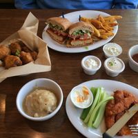 B wings, cauli mash, crispy cauliflower, buffalo bomber (replaced by the crispy buffalo chick'n sandwich) at Next Level Veggie Grill - University Village in Seattle