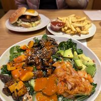 Kimchi steak bowl, kimchi burger and fries  at Veggie Grill by Next Level - University Village in Seattle