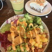 Tofu teriyaki protein bowl, tropical smoothie, carrot cake   at Next Level Veggie Grill - University Village in Seattle