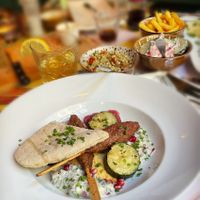 Vegan lamb kebab with two vegan side dishes and fries.  at Humphrey's in Breda