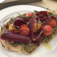 Toast with broccoli pesto, beetroot and tomato (normally mushrooms on top)   at Franca in Montevideo
