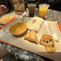 Kadhai Paneer with side of biryani and naan  at Maya Indian Veggie Delight in Central Singapore