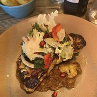 Cauliflower steak on a bed of spicy lentils   at Lovage  in Newcastle Upon Tyne
