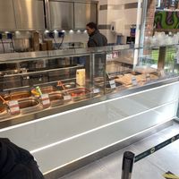 Hot food serving area  at Wasabi - Victoria Station in London