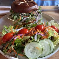 Lion’s mane burger with side salad   at Buddha Belly Burger in Sacramento