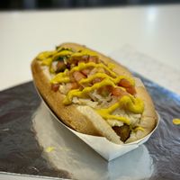 Vegan Dog with tomatoes, onions, sauerkraut and mustard  at Haute Doggery in Las Vegas
