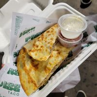 Vegan quesadilla with sour cream and Pico at Paradise Taco in Brooklyn