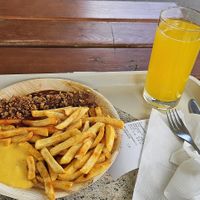 Vegan currywurst bastei style with fries and cheese sauce. at Panorama-Biergarten Bastei in Lohmen