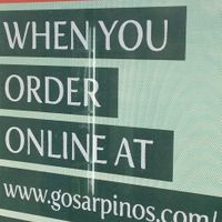 10% discount sign on window at Sarpino's Pizzeria in Eagan