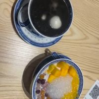 Black sesame soup with rice balls and coconut mango soup at Zhao Desserts in Kuala Lumpur