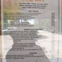 Cafe menu with labelled vegetarian options   at Gunung Mulu National Park Cafe in Mulu