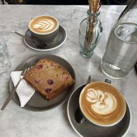 Oat milk cappuccino and raspberry loaf cake  at Five Ways Coffee in Amsterdam