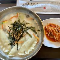 Rice cake soup with complimentary kimchi! Super delicious, perfectly seasoned!  at Vegan Insa - 비건인사 in Seoul
