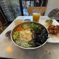 Vegan bibimbap, chili fried tofu and mango rice drink  at Vegan Insa - 비건인사 in Seoul