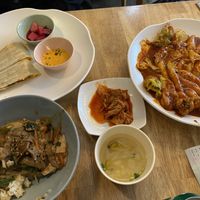 Clockwise from top left: Kimchi quesadilla, tteokbokki with dumplings and fish cakes, and bulgogi.   at Vegan Insa - 비건인사 in Seoul
