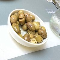 Complementary olives at Dopios  in Athens