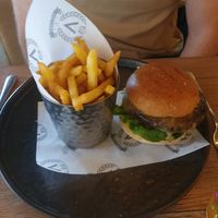 MOVING MOUNTAINS VEGAN BURGER: Applewood Vegan Smoked Cheese, Vegan Mayonnaise, Salad, House Bun, Fries at Victors in Alderley Edge