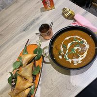 Veg samosas and butter chicken  at Vegan Dhaba in Birmingham