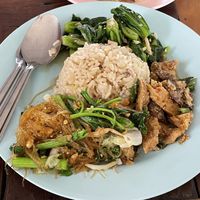 Three choices from the buffet with rice. With a spring roll it came to 80 baht.  at Tawanthong Restaurant and Shop in Khon Kaen