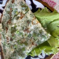 Veg pancake with Scallions  at Art Cafe Norgis in Samarkand