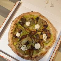 Pizza with potato and cashew cream at Sapori di Casa in Bologna