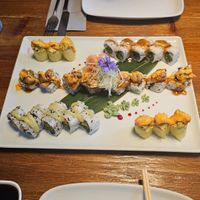 Vegan platter + spicy mushroom roll in centre.  at KUKU in Plymouth