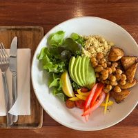 Vegan buddha brunch - scrambled tofu, spiced potatoes, avocado, roasted chickpeas, salad  at TAN HOSTEL x CAFE in Ao Nang