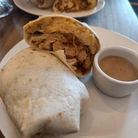 Chickn, onion and hash browns wrap with peppered sauce at Harry's at 387 in Belfast