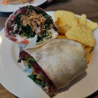 Wrap with homemade seitan slices, sage stuffing, spinach, cranberry sauce and mayo! at Harry's at 387 in Belfast
