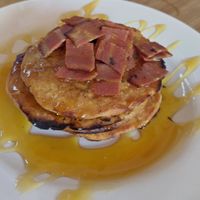 Harry's pancake stack with maple syrup and crispy facon at Harry's at 387 in Belfast