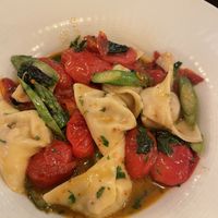 Tortellini with artichoke and crème, tomatoes and asparagus. Very special, recommended  at 1910 in Degania Alef