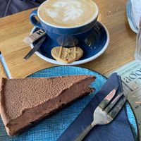 Chocolate pie, cappuccino with pea milk  at Lagom in Amsterdam