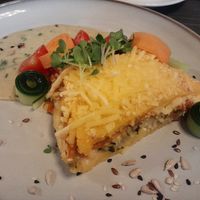 Polenta cake with vg cheese at This Place Doesn't Need A Name in Riga