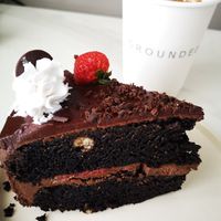 Iced Chai Latte and a SLAB of divine chocolate cake! at Grounded  in El Nido