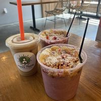 “Powercat” açaí bowl and iced coffee made with coconut milk   at Happy Hippie AggieVille  in Manhattan