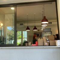 Window from inside to outside   at Pete's Bagels and General Store in Tampa