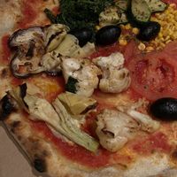 pizza vegan (viene con un barattolino di hummus)  at Martinerhof's Brauhotel in St Martin In Passeier