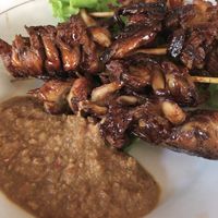 Sate jamur made with mushrooms with a peanut sauce   at Siboghana Waroeng in Ubud