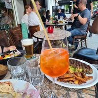 Aperol Spritz with a pasta-straw - great idea at Terzo Mondo in Berlin