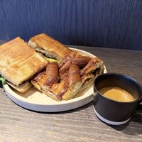 Mushroom focaccia, cinnamon bread and double espresso    at Ole & Steen in London