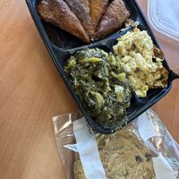Maple chik’n and Old Bay chik’n with creamy vegan mac & cheese, seasoned collard greens, and a chocolate chip cookie on the side. 🌱  at Elife in Capitol Heights