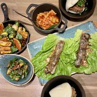 Vegan Green Sumo course 3. Aubergine bun, shiitake spring rolls, spicy brussels sprouts, smashed cucumber, kimchi.   at Hello Monkey Magasinsgatan in Gothenburg