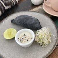 Charcoal empanada - dry outside  at Satiba Therapy Coffee Shop in Arequipa