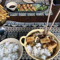 Mountain spice tofu with rice. My friend got the vegan dumplings and potato chips    at ChuSu Kitchen in Lao Cai