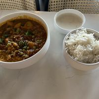 Aloo matar served steaming!  (Didn’t eat the yogurt sauce)  at Naan At Northwoods in North Charleston