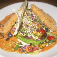 Grilled avocado dish at Gratitude Restaurant in Munich