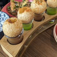 Pani puri (you tip the flavoured water into the puri) at Tikka Nation  in St Albans