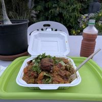 Vegetable stew and watermelon juice   at Oasis Ital and Nursery in Parish Land