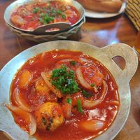 Tofu ball front and mixed pot behind with bread at Eros Vegan Restaurant (Veggie Saigon) in Da Nang