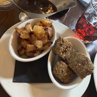 Maple & Wholegrain Mustard Parsnips + Sage & Onion Stuffing + Vegan Gravy + Vegan Cherry Ciderr  at The Lamplighter in Northampton